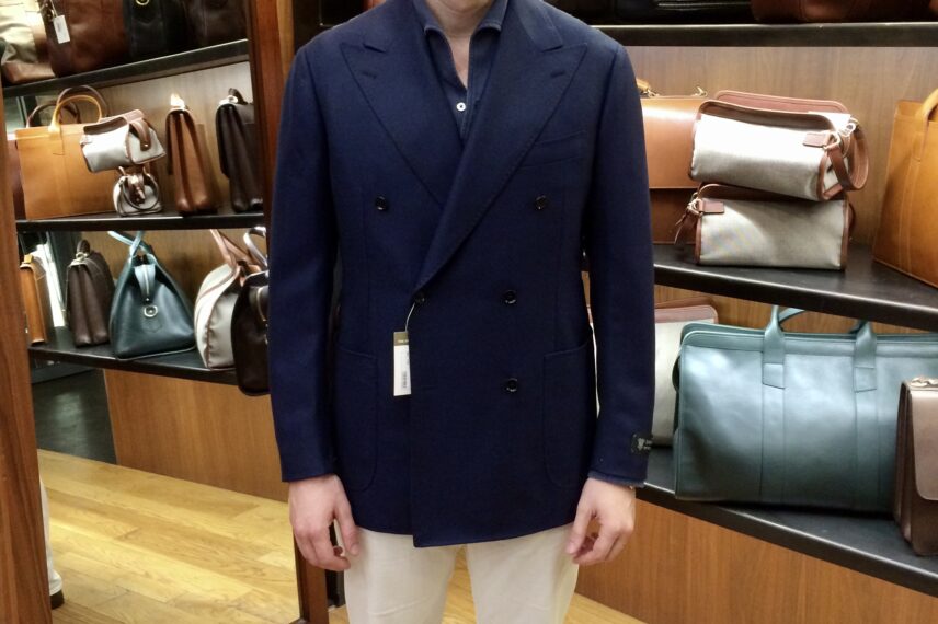 Navy double breasted blazer with white jeans