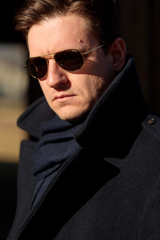 Polo Ralph Lauren navy peacoat With Randolph Aviators in gold, close up
